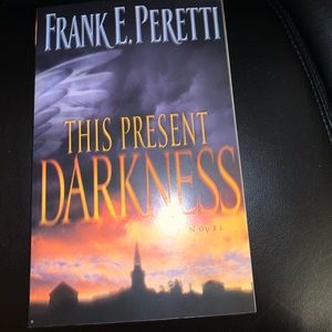 THIS PRESENT DARKNESS BY FRANK E. PERETTI